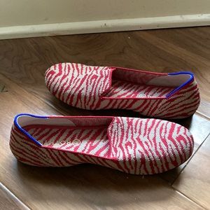 Women’s Rothy’s size 4 (fits like 5).  Like new condition.  Red and grey zebra